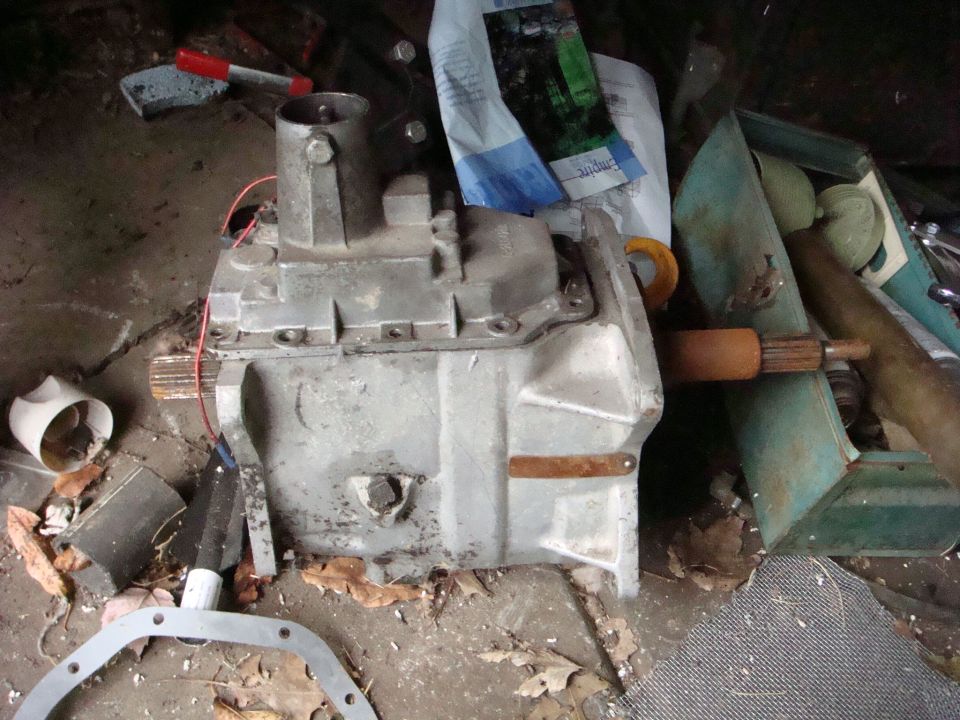 Jeep T-18 transmission with output shaft and shifter linkage visible