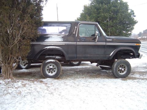 1979 Ford Bronco - This 1979 Ford Bronco is seen parked outdoors during a snowy day.