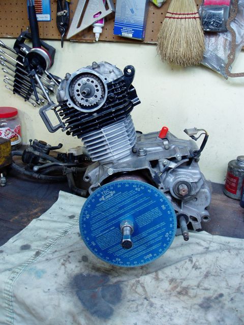 2000 Ford E350 - Motorcycle engine with a blue timing wheel for setting ignition timing.