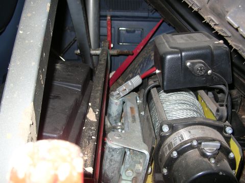 1985 Ford Bronco II - Warn Tabor-9K winch in cradle, locked down w/key. High-lift jack mounted to rollbar X-brace, positioned behind front seats and under spare…