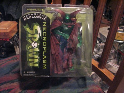 1991 Ford Bronco - Spawn Necroplasm action figure in its original McFarlane Toys packaging.