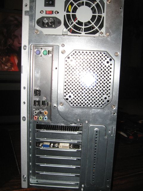 1988 Ford Bronco - Computer tower rear panel with ports, fan, and power input.