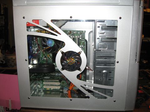 1988 Ford Bronco - Interior view of a silver computer case, showing fans, motherboard, and wiring.