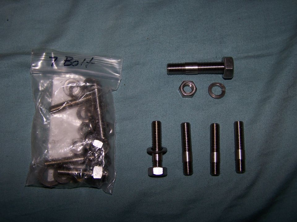 Bag of bolts and washers, plus loose bolts, nuts, and washers