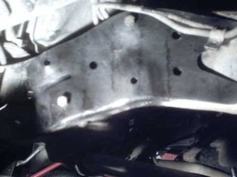 1984 Chevrolet Blazer - A close-up view of a vehicle's frame components, showing structural elements and wiring.