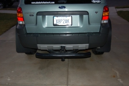 2006 Ford Escape - The rear of a 2006 Ford Escape is shown, a trailer hitch and license plate.