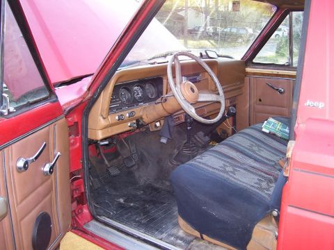 2004 Jeep TJ - Interior view of a Jeep, the dashboard, steering wheel, and seats.
