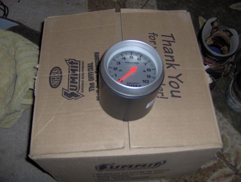 1978 Ford Bronco - tach setting inside the 3" coupler that I got at Lowes for $1.67