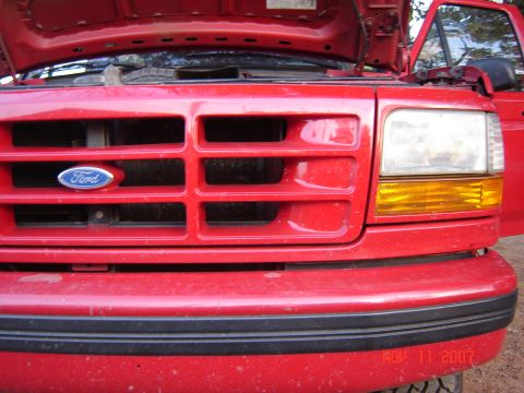 1995 Ford Bronco - Stock grill, before the intake.