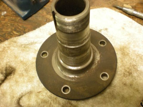 1993 Ford Bronco - Wheel hub assembly with visible wear marks, resting on a cloth.