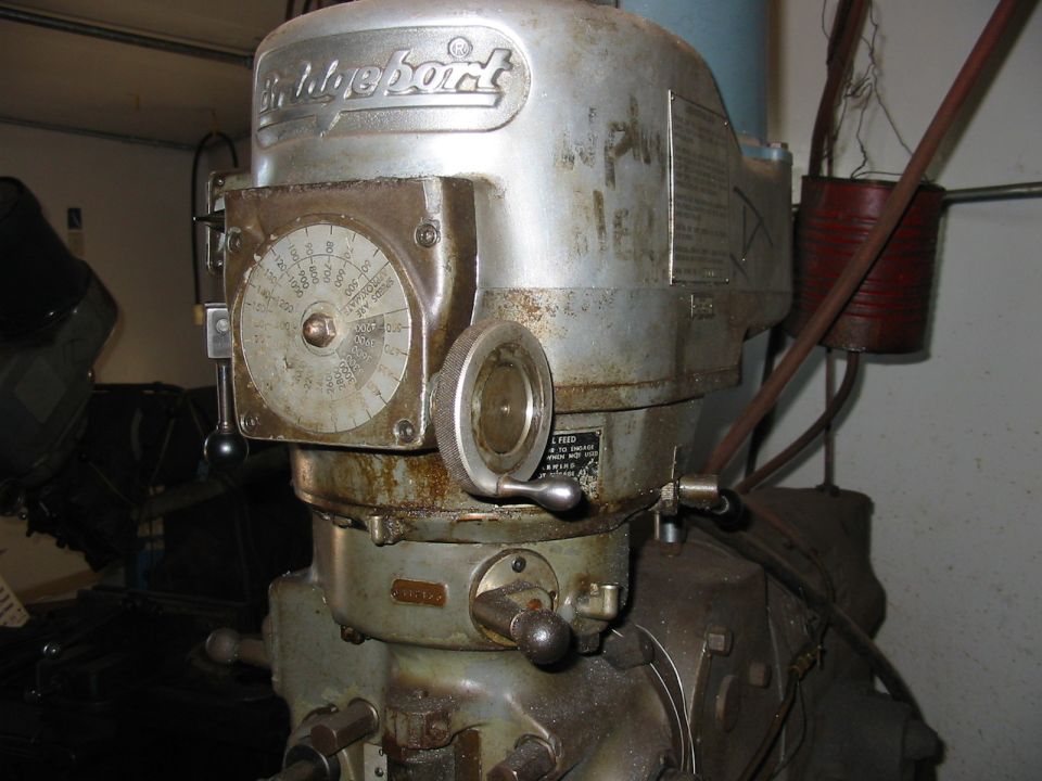 Bridgeport milling machine with a dial indicator and control levers