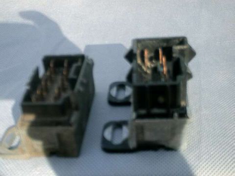 1976 Ford Ranchero - Two electrical relay sockets are shown against a textured background.