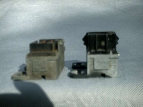 1976 Ford Ranchero - Two electrical relays are shown, one with a black top, against a textured background. The image includes a SuperMotors.net watermark.