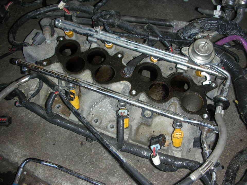 Top of engine intake ports with fuel rails and injector connectors
