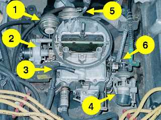1978 Ford Bronco - A detailed view of a vehicle's carburetor and surrounding engine components, marked with numbered indicators.