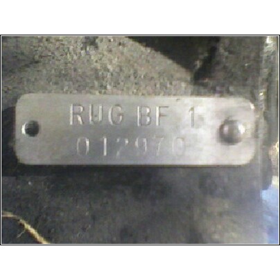 1972 Ford Ranchero - Close-up of a metal identification tag stamped with RUG BF 1 and the number 012970.