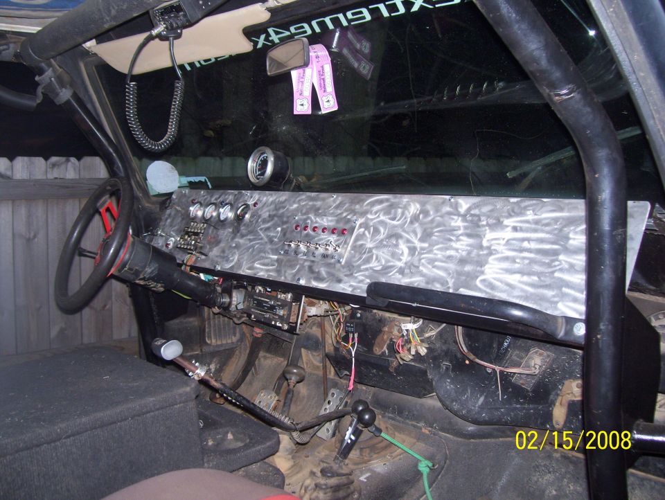 Custom dashboard with switches and gauges, interior view