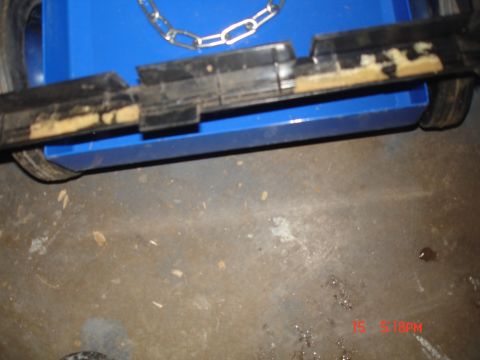 1979 Ford Bronco - A blue toolbox with a metal chain is visible in the image.