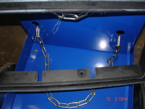1979 Ford Bronco - A blue metal box with chains and rubber padding is shown, with a timestamp in the corner.