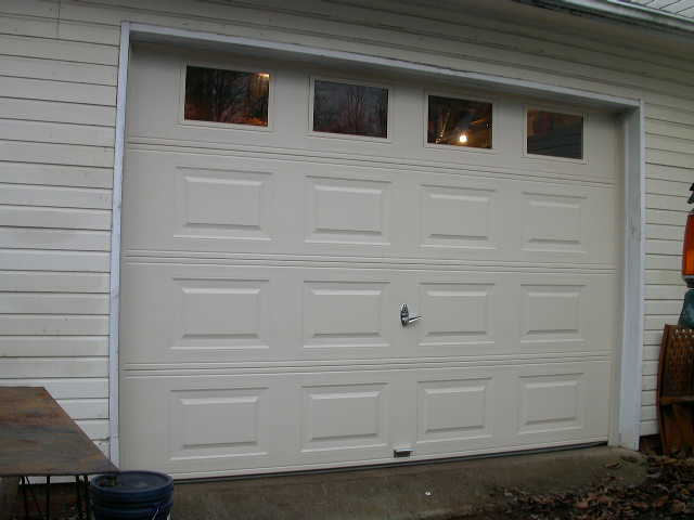 New steel, insulated, completely working garage door!
