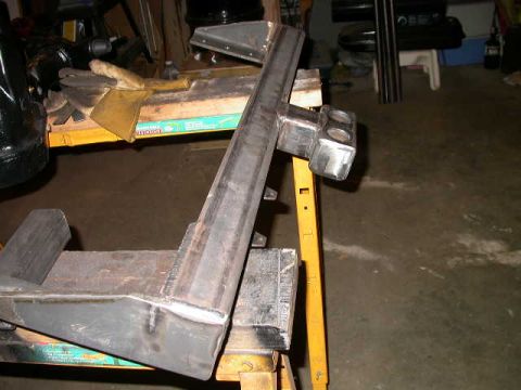 1990 Ford Bronco - Assembled tranny cross member. Note the two little tabs for the transmission wiring harness to bolt to so it doesn't get wrapped around the…