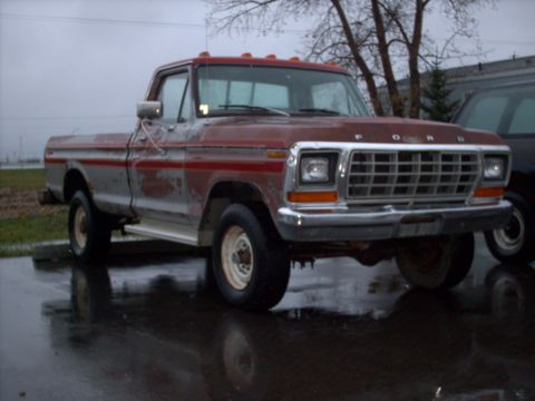 1979 Ford F-250 - This 1979 Ford F-250 pickup truck is shown from the front three-quarter view on a cloudy day.