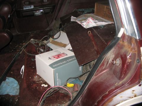 1979 Ford LTD - Area where the previous subject previously resided. I need to dig under that carpet and fetch the fuel sender wiring.