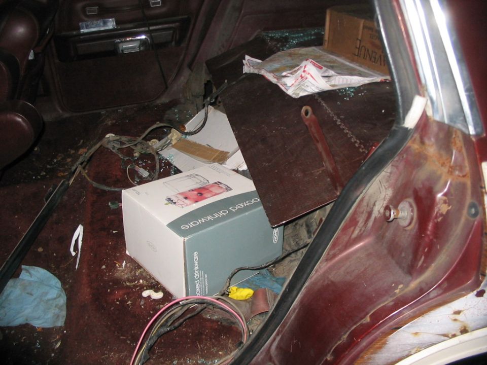 Area where the previous subject previously resided.  I need to dig under that carpet and fetch the fuel sender wiring.