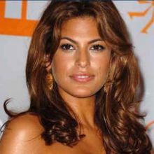 1976 Toyota Land Cruiser - Portrait of Eva Mendes with a "SUPERMOTORS" logo visible.
