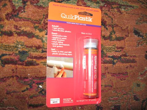 2004 Ford Crown Victoria - QuikPlastik plastic repair putty stick is packaged with instructions for various plastic repairs.