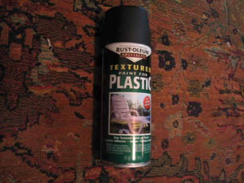 2004 Ford Crown Victoria - A can of Rust-Oleum Specialty Textured Paint for Plastic is shown on a patterned rug.
