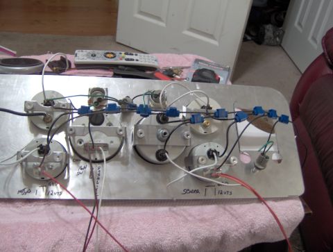 1978 Ford Bronco - A collection of vehicle gauges and their associated wiring are shown, possibly for a custom installation or repair.
