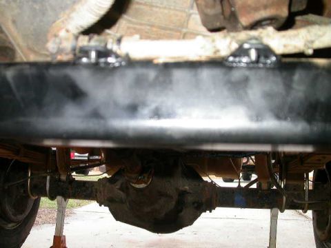 1990 Ford Bronco - Tabs on cross member for bolting tranny wiring harness too.