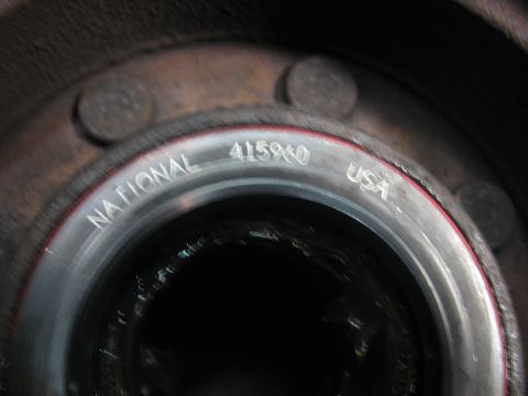 1995 Ford C-350 (Centurion Conversions) - Close-up of a wheel bearing showing manufacturer and part number.