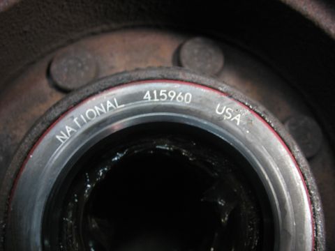 1995 Ford C-350 (Centurion Conversions) - Close-up of a wheel bearing labeled 'NATIONAL 415960 USA'.