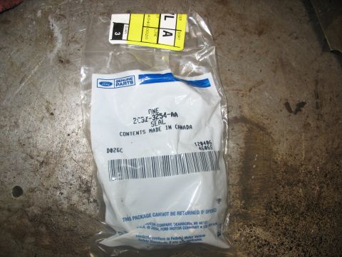 1995 Ford C-350 (Centurion Conversions) - A sealed Ford parts package containing a seal with part number 2C3Z-3254-AA.
