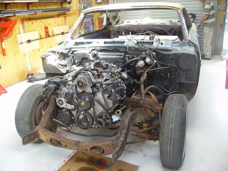Car chassis with engine removed, front view