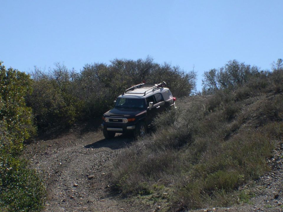 Dark 2007 Toyota FJ Cruiser on a dirt trail