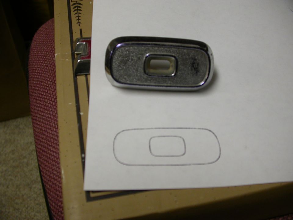 Chrome emblem with cutout and paper template
