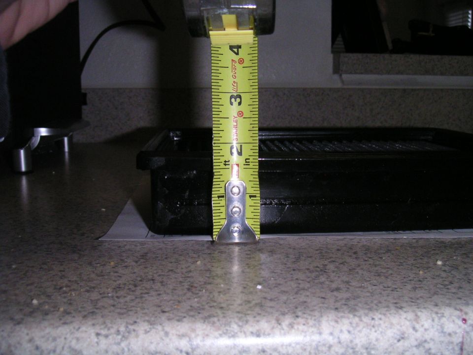 Tape measure shows black part is 3 inches tall