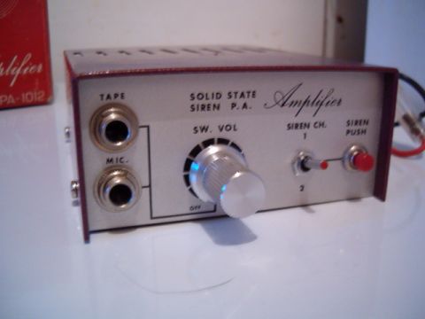 1991 Ford Crown Victoria - A Solid State Siren P.A. Amplifier is shown with various controls and inputs.