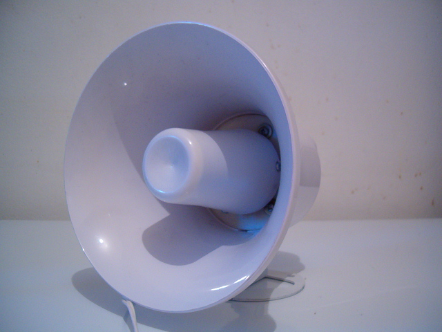 White horn speaker with a wide bell and a smaller cylindrical output