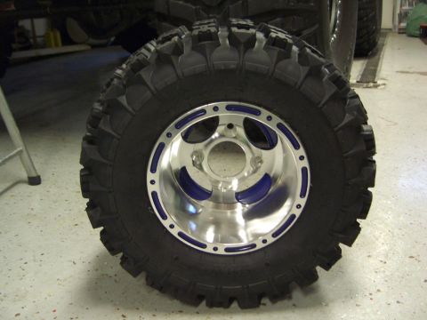 1974 Ford Bronco - This photo shows a single off-road tire and custom wheel, not a 1974 Ford Bronco.