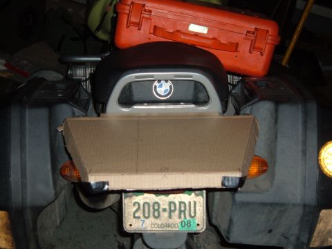 1998 BMW R1100GS ABS - Cardboard attached to a motorcycle's rear rack, obscuring the license plate.