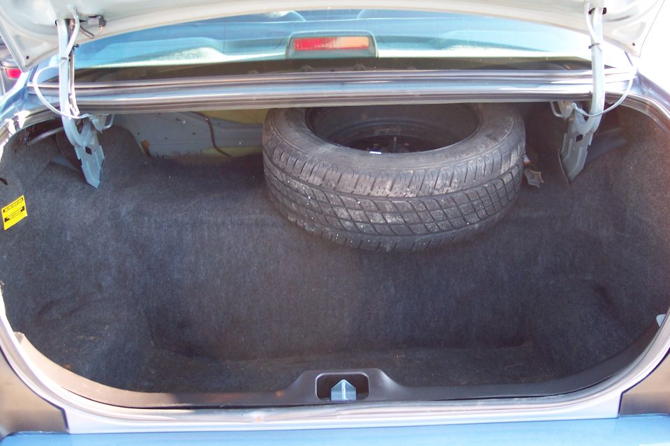 Trunk interior with spare tire, 2001 Ford Crown Victoria
