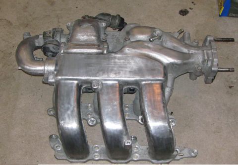 1993 Ford Probe - This is a vehicle intake manifold, likely made of aluminum, shown from a top-down perspective.