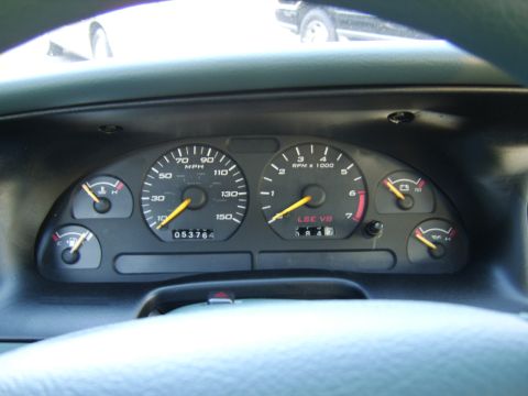 1996 Mercury Grand Marquis - The dashboard gauges show the vehicle's speed, RPM, fuel level, and engine temperature.