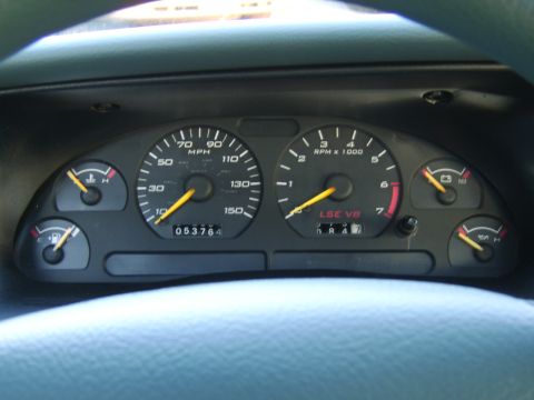 1996 Mercury Grand Marquis - The vehicle's dashboard displays the speedometer, tachometer, and other essential gauges, with an odometer reading of 53,764 miles.