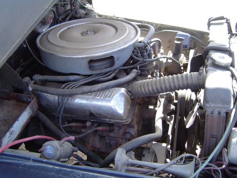 1989 Ford Bronco - The engine bay shows a Ford V8 engine, but it does not appear to be from 1989.
