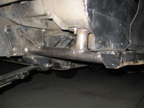 1994 Ford Bronco - Custom chassis modifications are visible on the underbody of this vehicle, welded tubing and brackets.